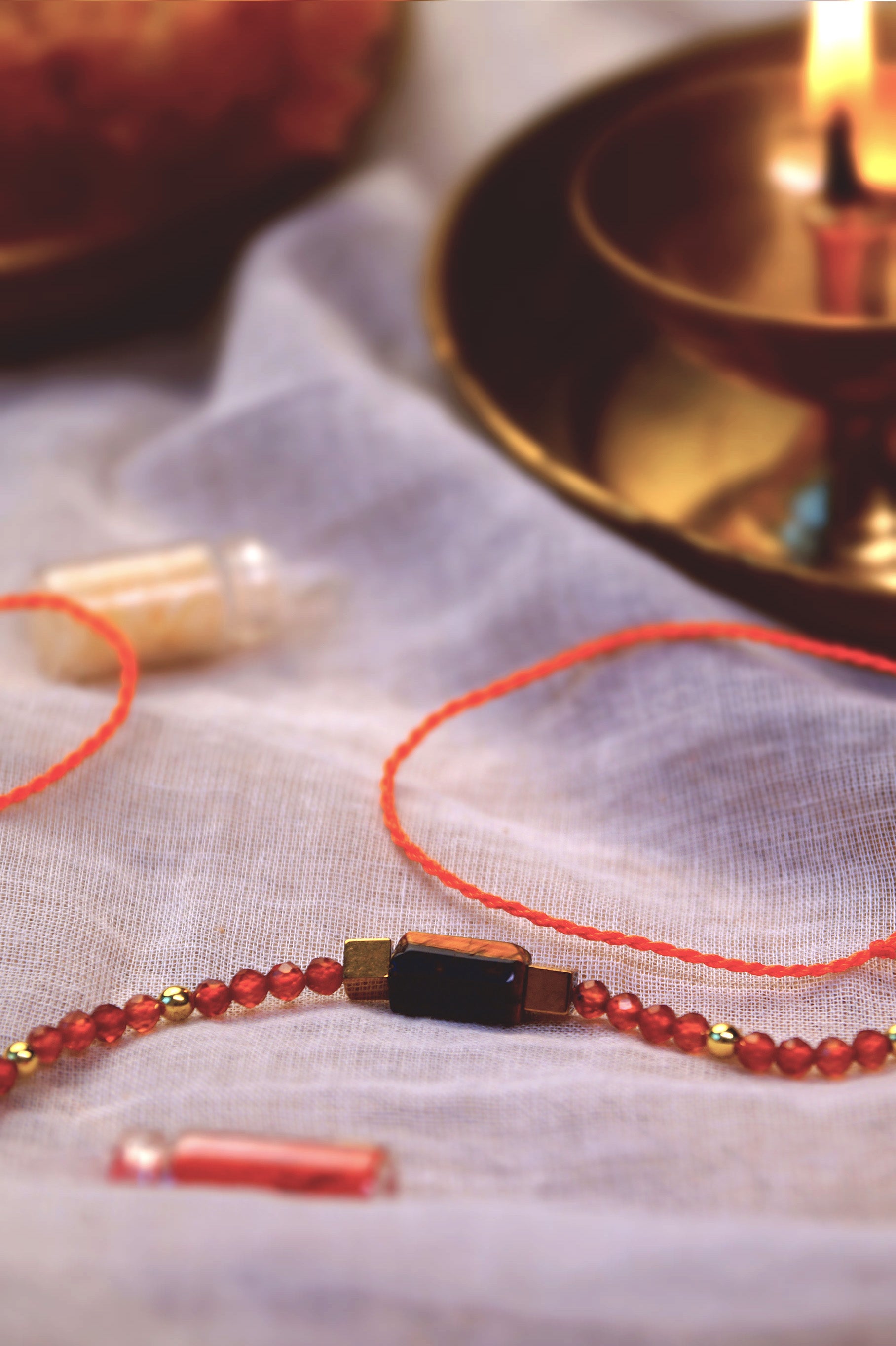 Tiger Eye & Red Onyx Crystal Rakhi